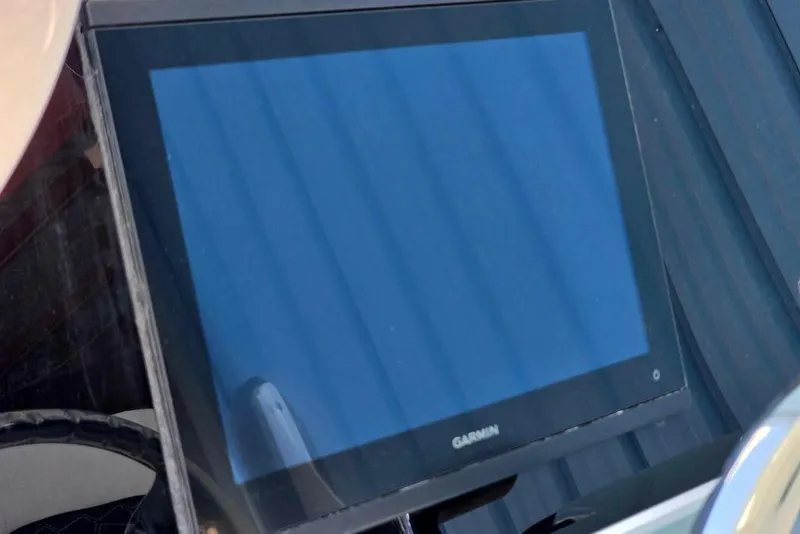 Slide: The Image of Garmin display on 2026 Tidewater 2210 Carolina Bay boat dashboard. - 24