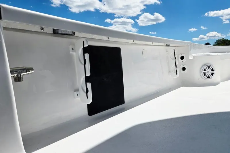 Slide: The Image of 2026 Tidewater 2210 Carolina Bay boat interior with sleek white design and modern features. - 30