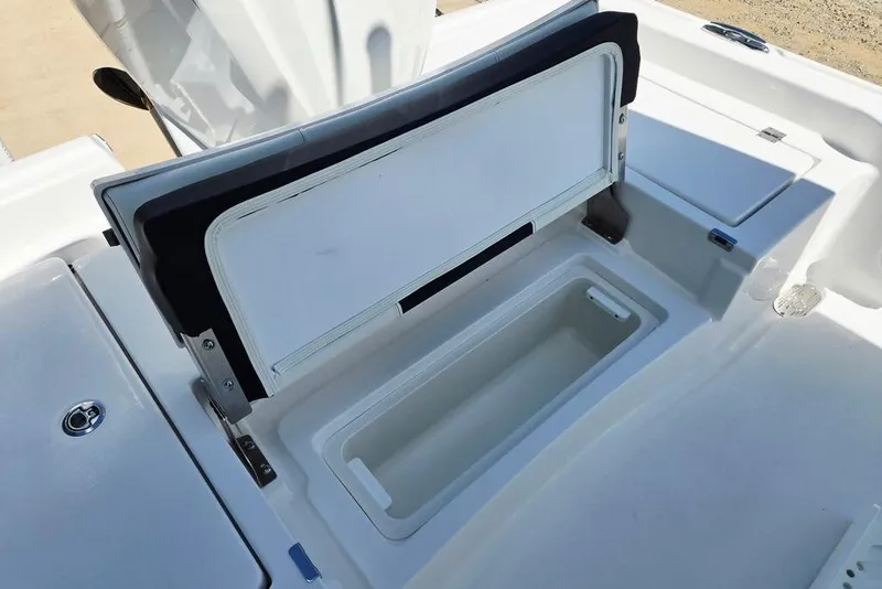 Slide: The Image of Open storage compartment on 2026 Tidewater 2210 Carolina Bay boat. - 31