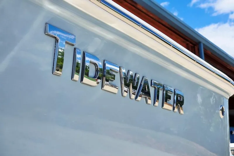 Slide: The Image of 2026 Tidewater 2210 Carolina Bay boat with chrome lettering detail. - 5