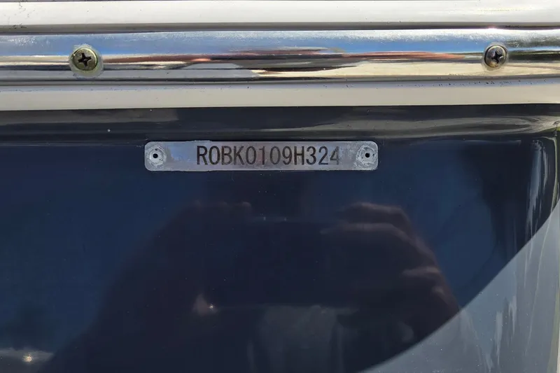 Slide: The Image of 2024 Robalo 246 Cayman boat identification plate with serial number. - 23