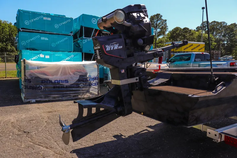 Slide: The Image of 2026 Gator Tail 18/60 Extreme Series boat with powerful outboard motor in outdoor setting. - 13
