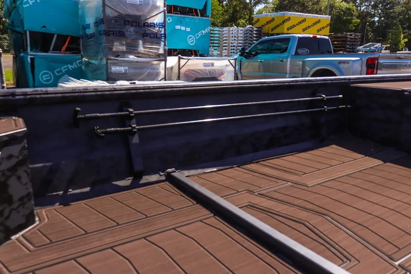 Slide: The Image of Interior view of a 2026 Gator Tail 18/60 Extreme Series boat with storage racks. - 14