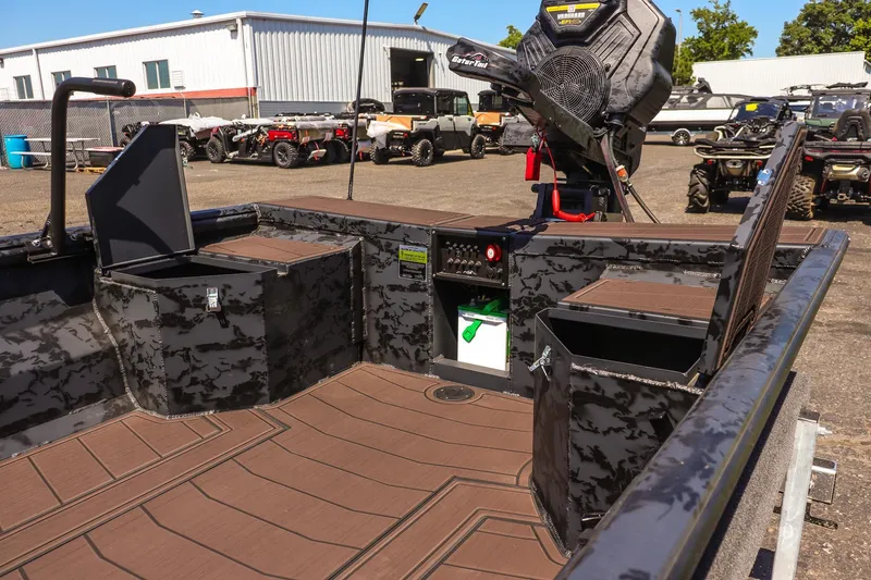 Slide: The Image of Interior of 2026 Gator Tail 18/60 Extreme Series boat with camo design and equipment. - 15