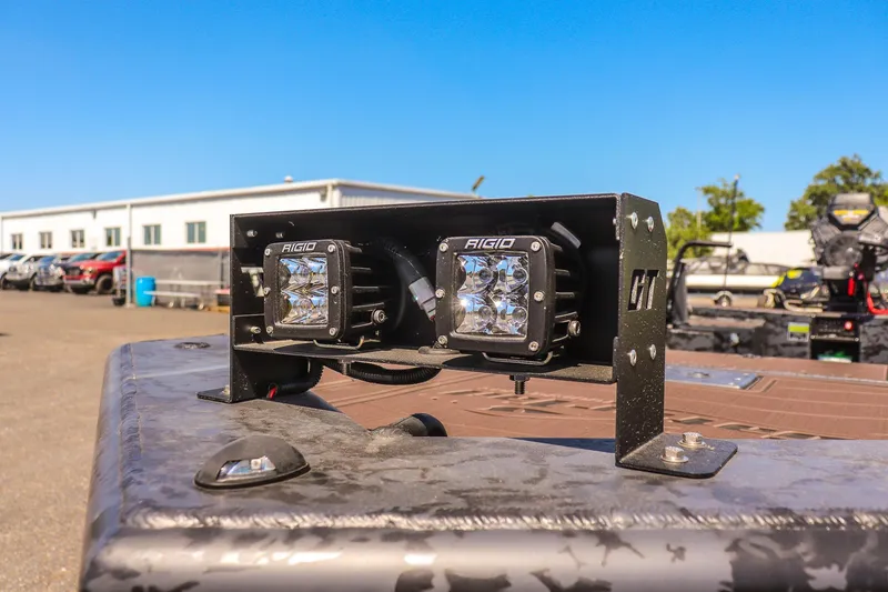 Slide: The Image of LED lights on a 2026 Gator Tail 18/60 Extreme Series boat, outdoor setting. - 16