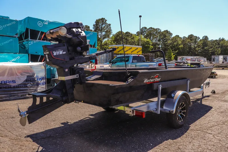 Slide: The Image of 2026 Gator Tail 18/60 Extreme Series boat on trailer in outdoor setting. - 5