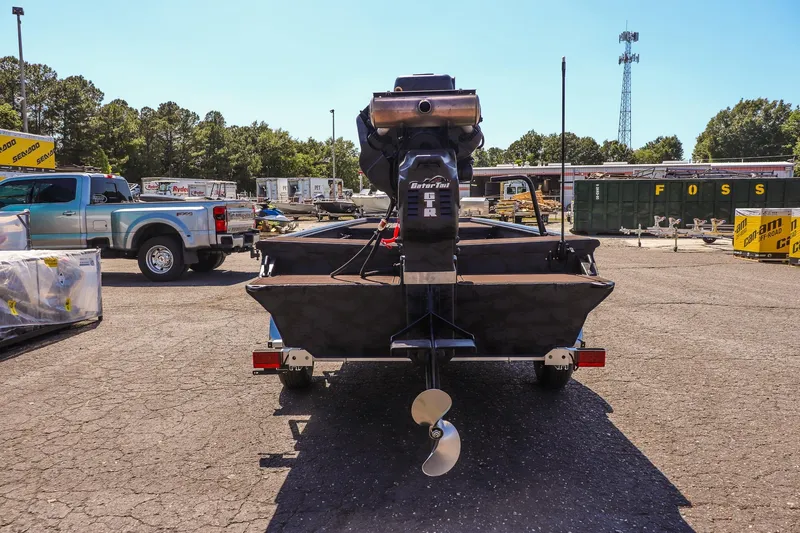 Slide: The Image of 2026 Gator Tail 18/60 Extreme Series boat on trailer in outdoor lot. - 6