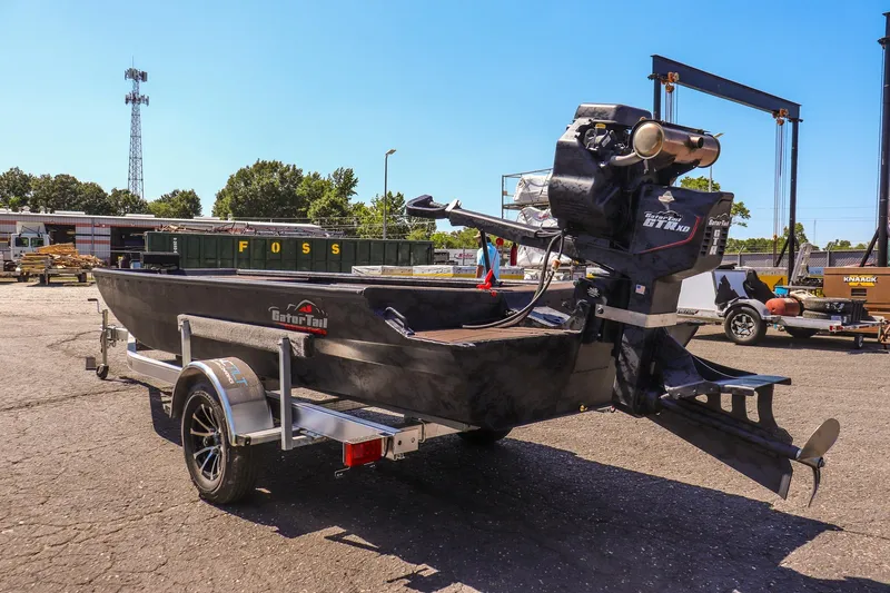 Slide: The Image of 2026 Gator Tail 18/60 Extreme Series boat on trailer in outdoor setting. - 7