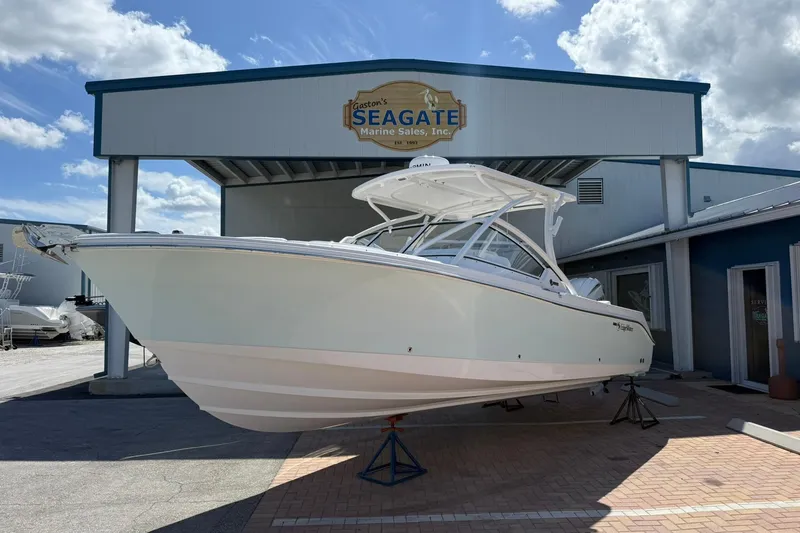 The Image of 2026 Edgewater 248CX Crossover boat displayed at Seagate Marine Sales. - 1