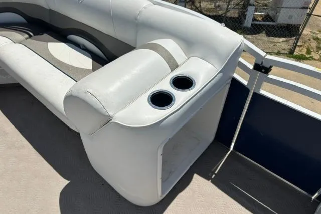 Slide: The Image of Interior seating of 2013 JC 23 Neptoon TT boat with cup holders. - 13