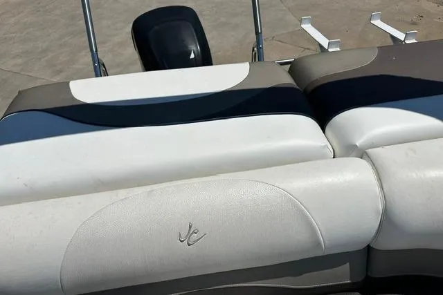 Slide: The Image of 2013 JC 23 Neptoon TT boat seats with stylish upholstery and logo detail. - 18