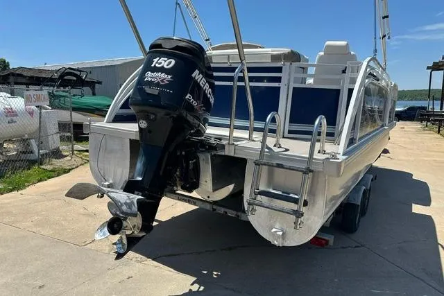Slide: The Image of 2013 JC 23 Neptoon TT pontoon boat with Mercury 150 outboard motor. - 6