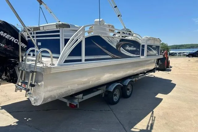 Slide: The Image of 2013 JC 23 Neptoon TT pontoon boat on trailer, parked outdoors. - 7