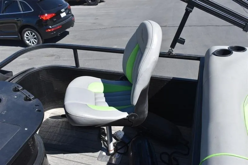 Slide: The Image of 2022 Lowe SF 212 Sport Fish boat seat with green accents and cup holders. - 21