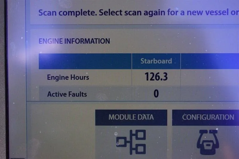 Slide: The Image of Display screen showing engine information for Lowe SF 212 Sport Fish, 2022 model. - 29