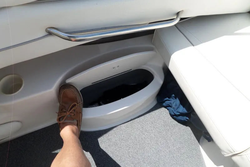 Slide: The Image of Foot on Maxum 2400 SC boat storage compartment, 2003 model interior view. - 38
