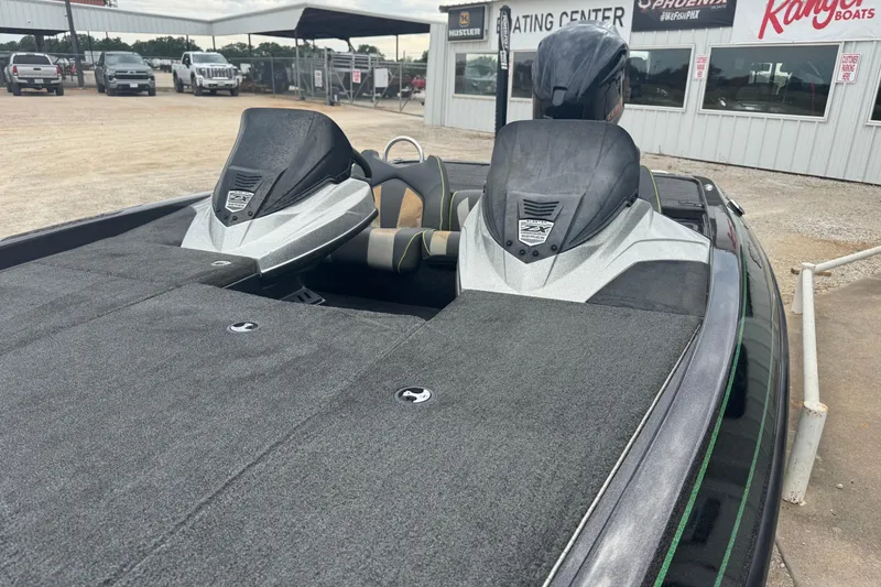 Slide: The Image of 2018 Skeeter ZX200 boat with dual seats, parked outside a dealership. - 10