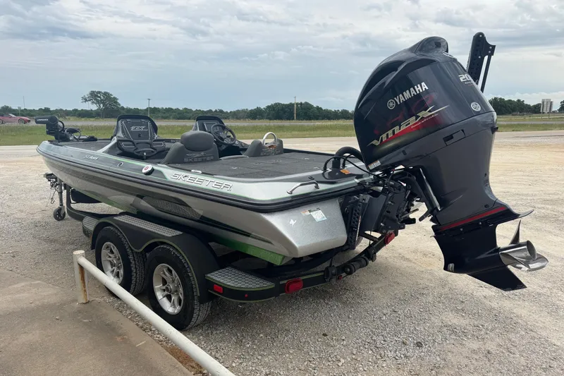 Slide: The Image of 2018 Skeeter ZX200 boat with Yamaha VMAX engine on a trailer. - 2