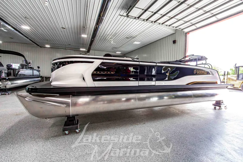 The Image of 2026 Godfrey Sanpan 2700 MTF pontoon boat in showroom, side view. - 0