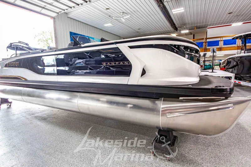 Slide: The Image of 2026 Godfrey Sanpan 2700 MTF pontoon boat in a showroom setting. - 5