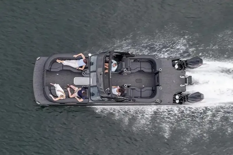 Slide: The Image of Manufacturer Provided Image: Manufacturer Provided Image: Aerial view of 2026 Godfrey Sanpan 2300 SBC pontoon boat cruising on water. - 7