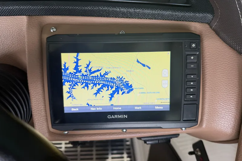 Slide: The Image of Garmin GPS navigation system in a 2012 Cobalt 242 boat, displaying a detailed lake map. - 11