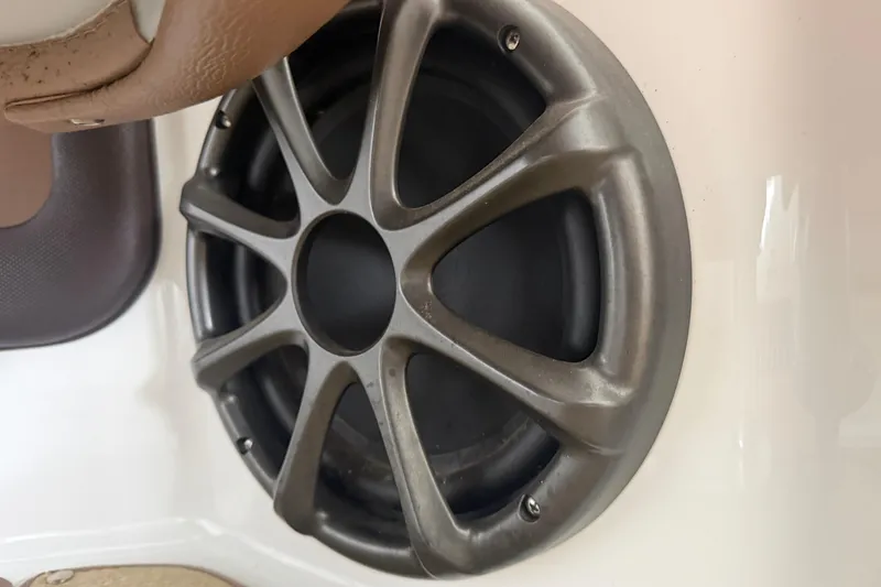 Slide: The Image of Close-up of a speaker in a 2012 Cobalt 242 boat interior. - 25