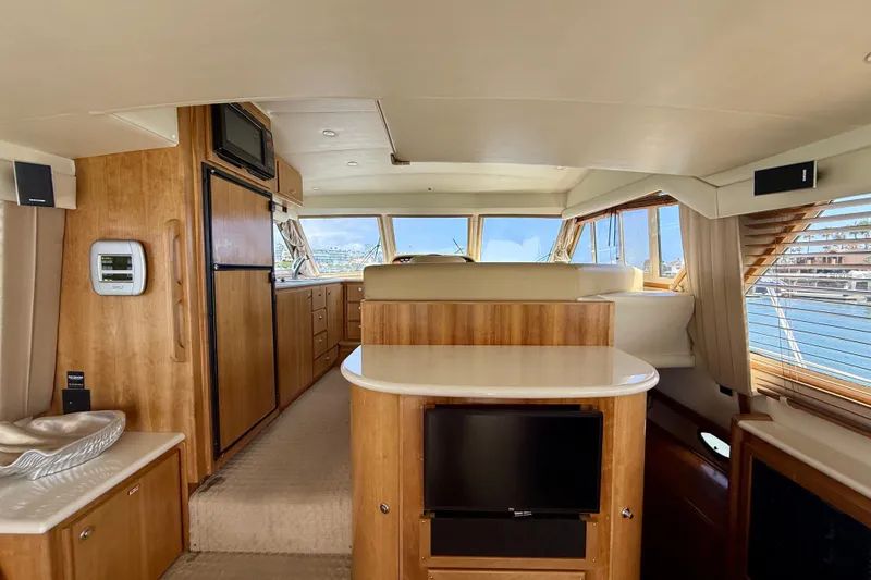 Slide: The Image of Luxurious interior of 2007 Navigator 44 Classic yacht with wood finishes and modern amenities. - 11