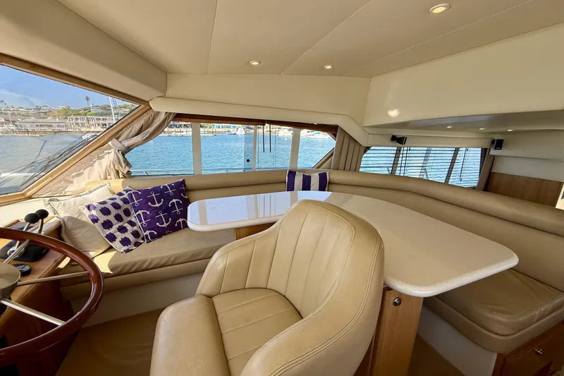 Slide: The Image of Luxurious interior of 2007 Navigator 44 Classic yacht with leather seating and nautical decor. - 15