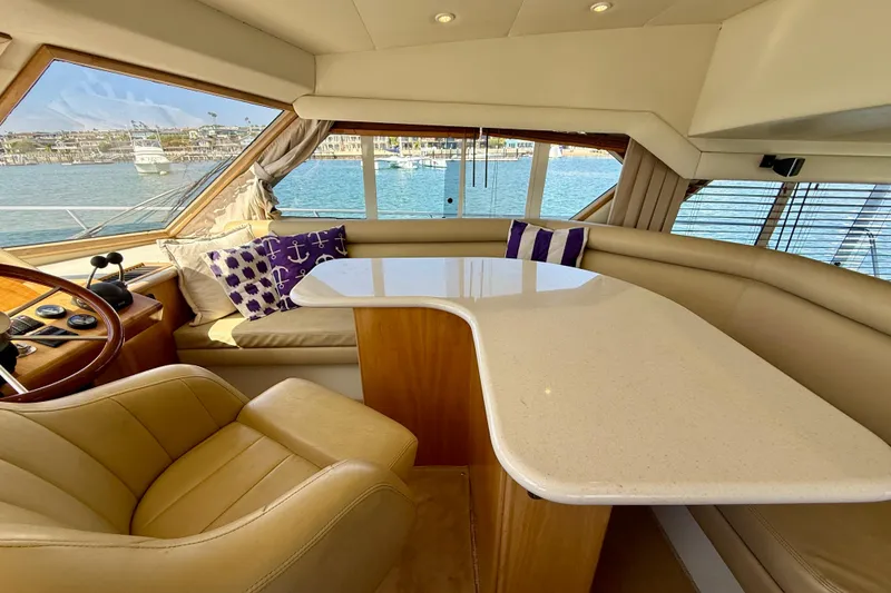 Slide: The Image of Luxurious interior of 2007 Navigator 44 Classic yacht with elegant seating and scenic water view. - 16