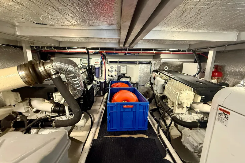 Slide: The Image of Engine room of 2007 Navigator 44 Classic yacht, featuring dual engines and equipment. - 36