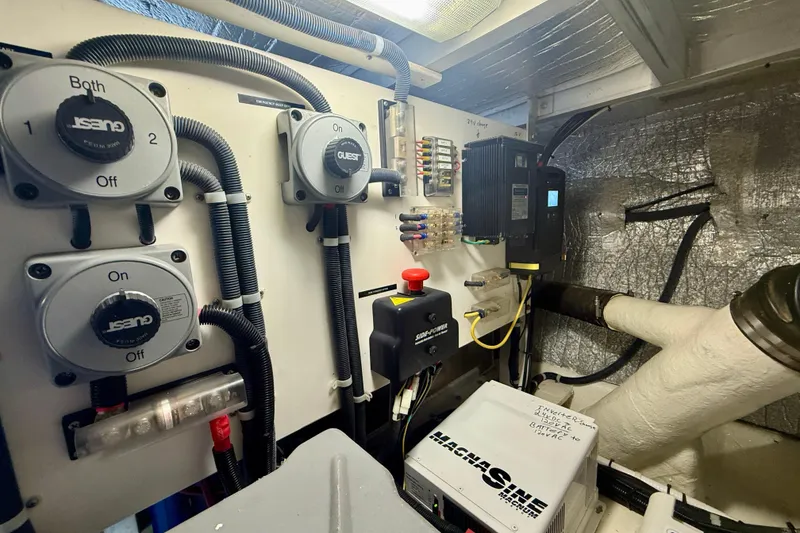 Slide: The Image of Engine room of 2007 Navigator 44 Classic yacht with electrical components and wiring. - 39