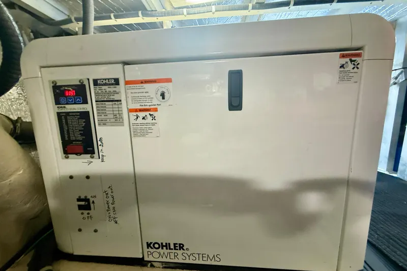 Slide: The Image of Kohler power system in 2007 Navigator 44 Classic yacht engine room. - 42