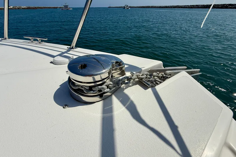 Slide: The Image of Anchor and chain on 2007 Navigator 44 Classic yacht deck, overlooking calm sea. - 54