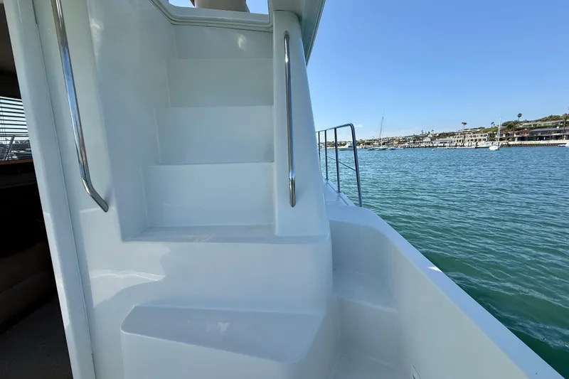 Slide: The Image of Staircase on 2007 Navigator 44 Classic yacht with ocean view in background. - 57