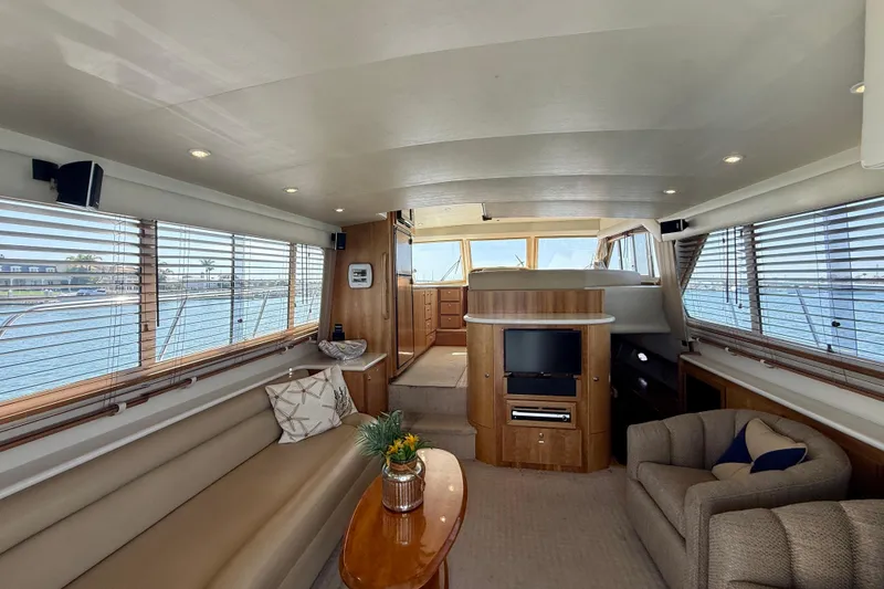 Slide: The Image of Luxurious interior of 2007 Navigator 44 Classic yacht with elegant seating and panoramic windows. - 7