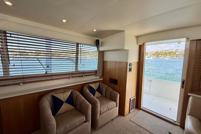 Slide: The Image of Interior of 2007 Navigator 44 Classic yacht with waterfront view through large windows. - 9