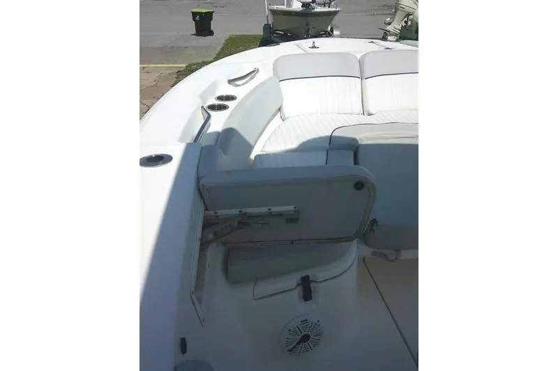 Slide: The Image of 2019 Sea Fox 248 Commander boat interior with white seating and cup holders. - 20