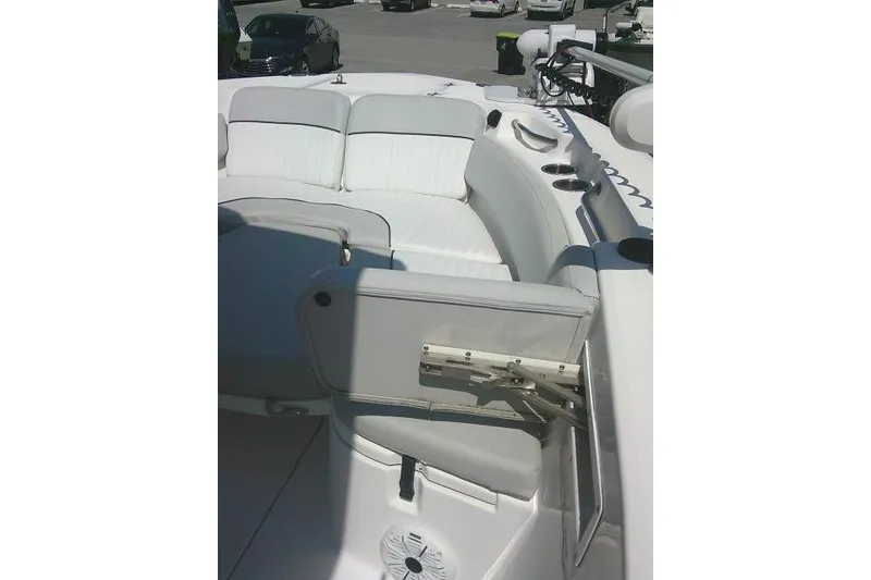 Slide: The Image of 2019 Sea Fox 248 Commander boat interior with white seating and cup holders. - 23