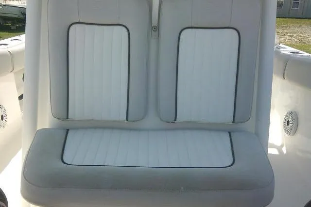 Slide: The Image of 2019 Sea Fox 248 Commander boat seating, featuring white cushioned upholstery. - 25