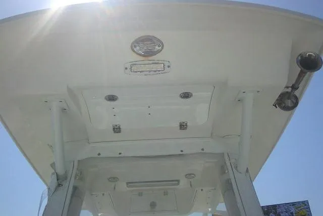 Slide: The Image of 2019 Sea Fox 248 Commander boat's T-top view under bright sunlight. - 27