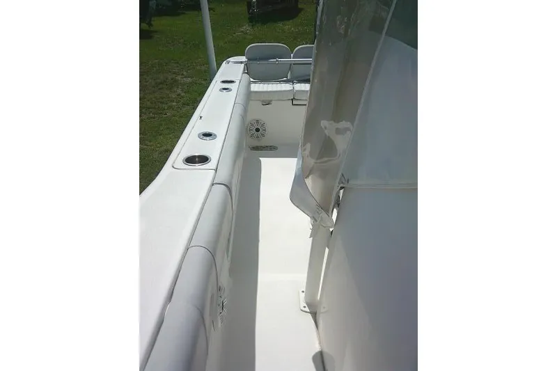 Slide: The Image of 2019 Sea Fox 248 Commander boat interior with seating and cup holders. - 30