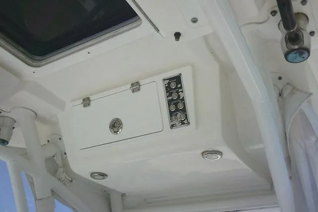 Slide: The Image of 2019 Sea Fox 248 Commander boat console with storage compartment and control panel. - 35