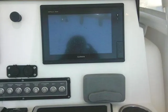Slide: The Image of 2019 Sea Fox 248 Commander dashboard with Garmin GPS and control panel. - 41