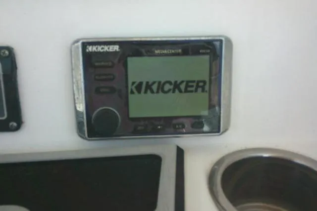 Slide: The Image of Kicker audio system on 2019 Sea Fox 248 Commander boat dashboard. - 42
