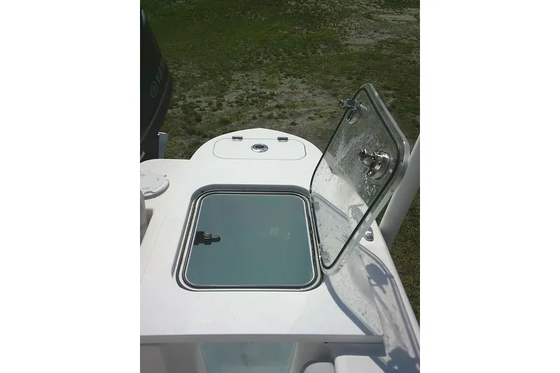 Slide: The Image of Open hatch on 2019 Sea Fox 248 Commander boat, showcasing storage compartment. - 48