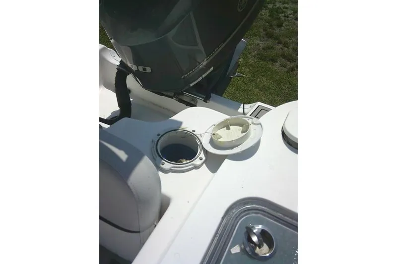 Slide: The Image of 2019 Sea Fox 248 Commander boat deck with open hatch and engine view. - 49