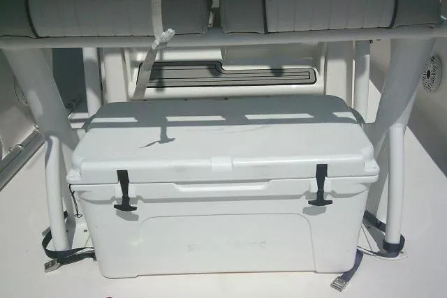 Slide: The Image of White cooler secured on a 2019 Sea Fox 248 Commander boat deck. - 52