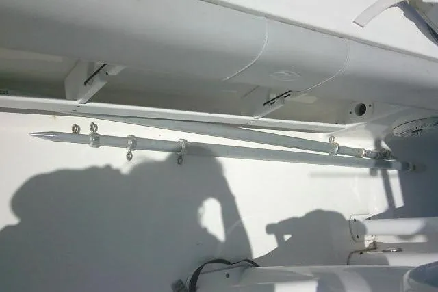 Slide: The Image of 2019 Sea Fox 248 Commander boat interior with rod holder and shadow. - 55
