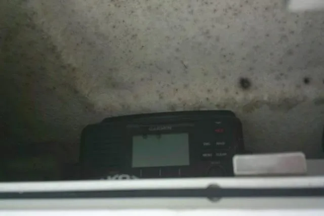 Slide: The Image of Radio equipment inside a 2019 Sea Fox 248 Commander boat compartment. - 57